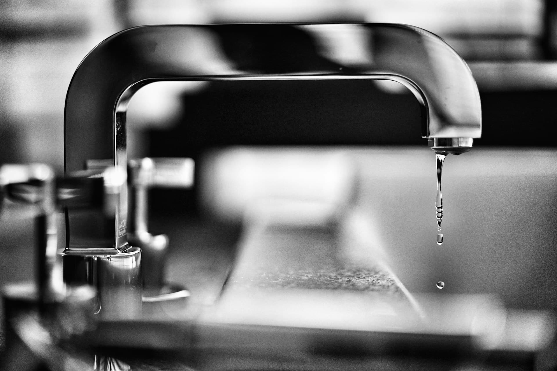 A water faucet drips