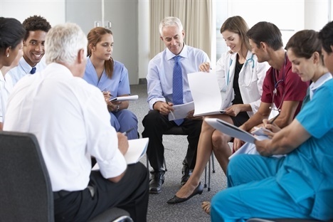 A group of medical staff in a circle
