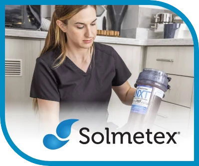 Image of Solmetex with a dental assistance working in the background.