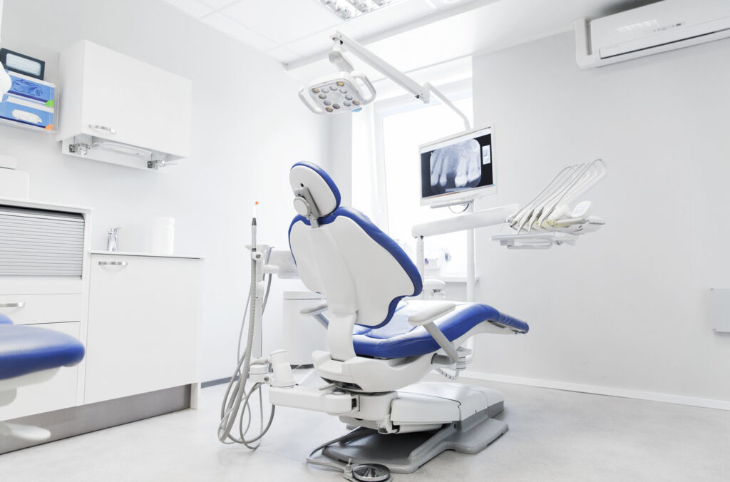interior of new modern dental clinic office with chair