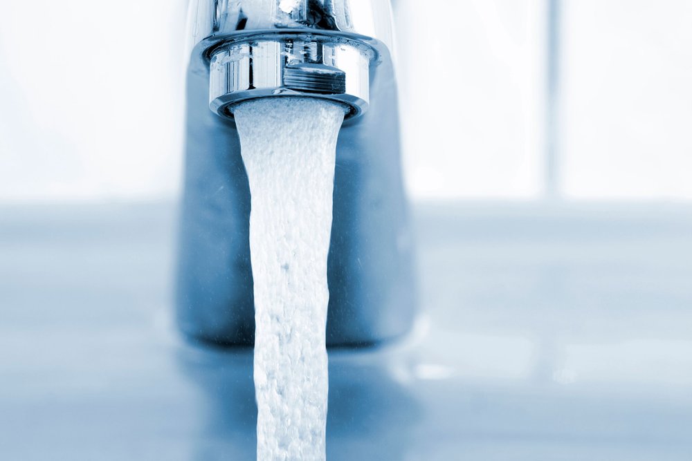A faucet running water