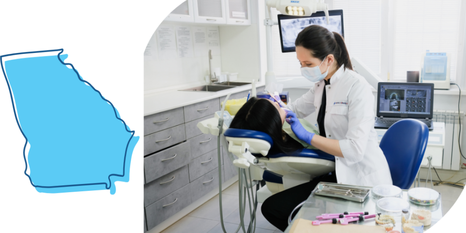A Georgia dentist works on a patient