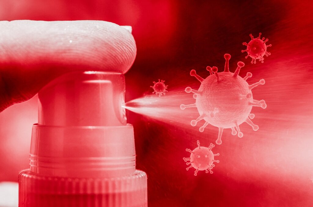 Spray disinfectant battling aerosol particles.