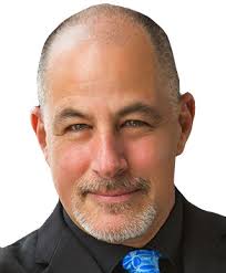 Dr. Charles Schlesinger